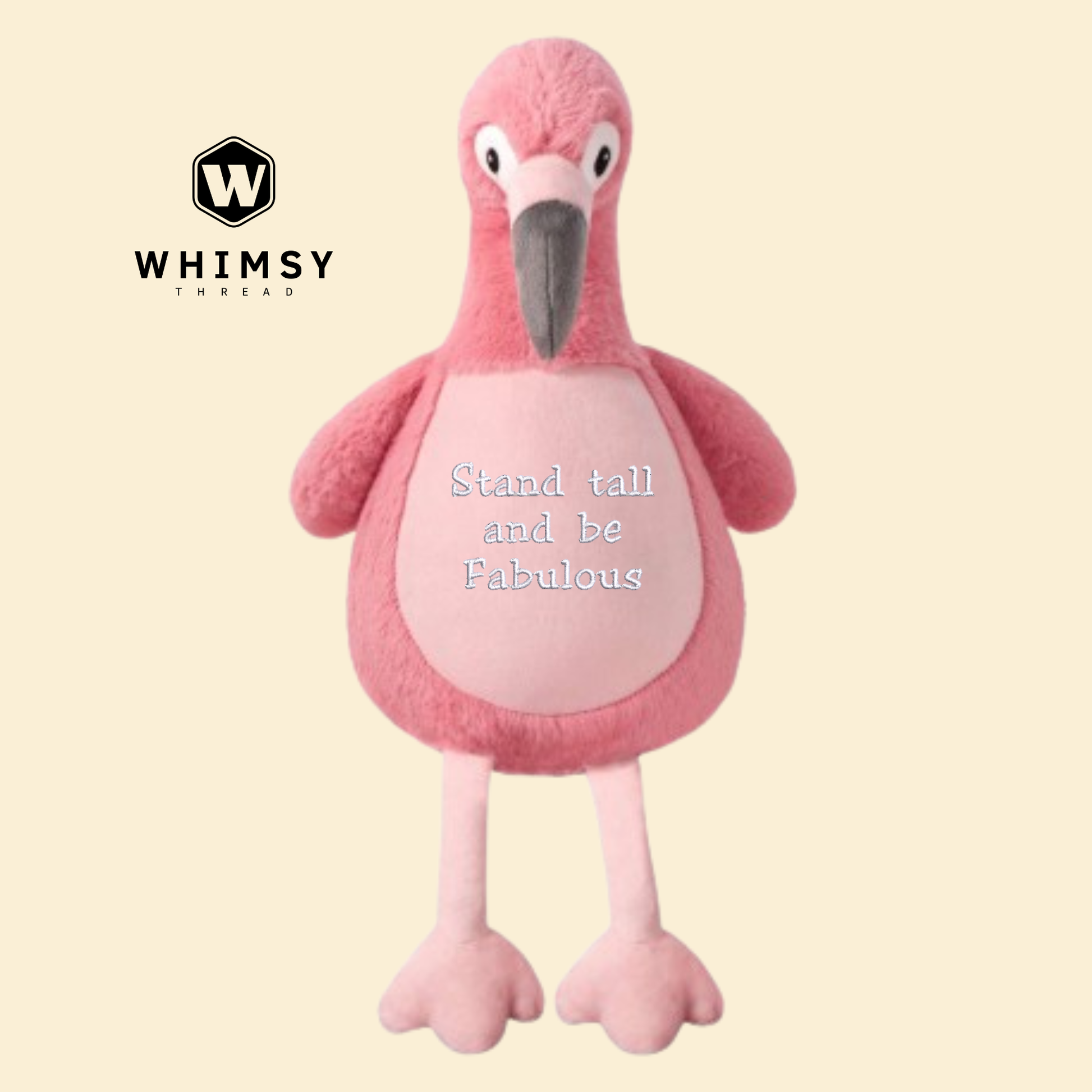 Pink flamingo plush toy with 'Stand tall and be fabulous' text on a beige background, branded with Whimsy Thread.